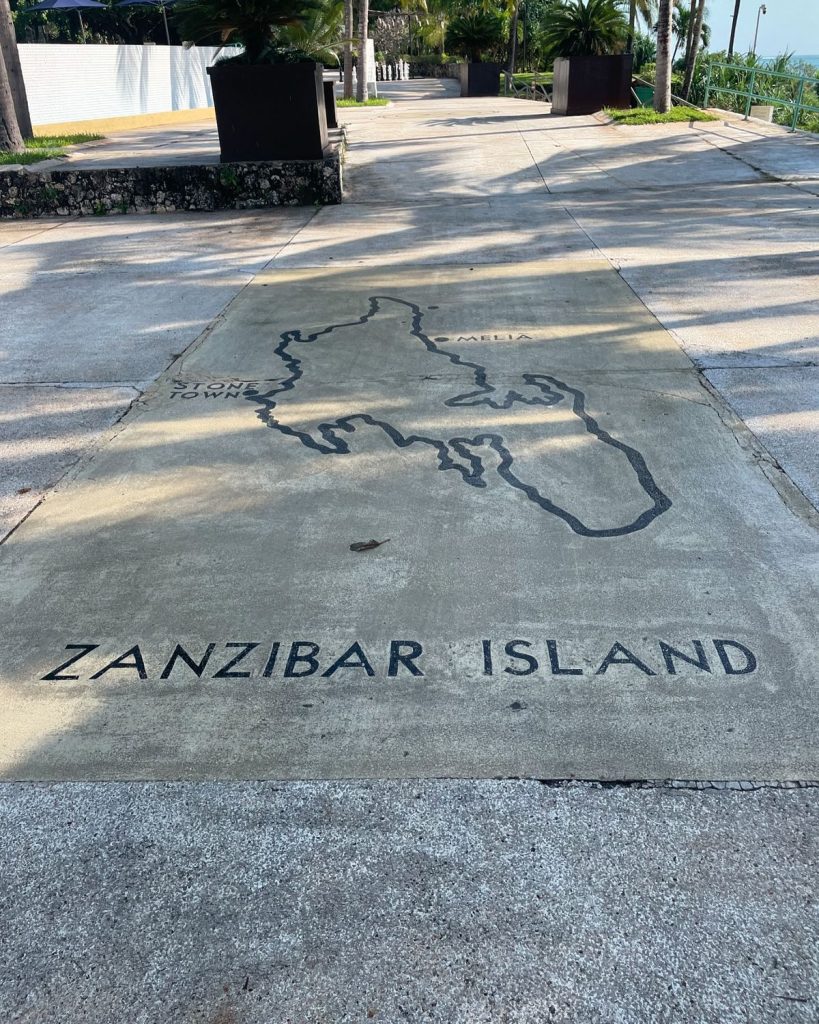 Stone Town streets and a car rental in Zanzibar with airport delivery price vehicle