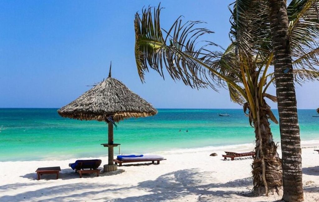 ZNZ Airport to Jambiani Transfer - Driving along scenic coastal road toward Jambiani Beach resort