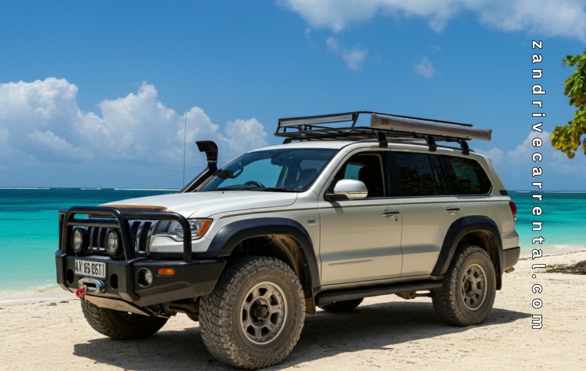 Self-drive rental car on a Zanzibar coastal road, a comfortable alternative to quad bike rental