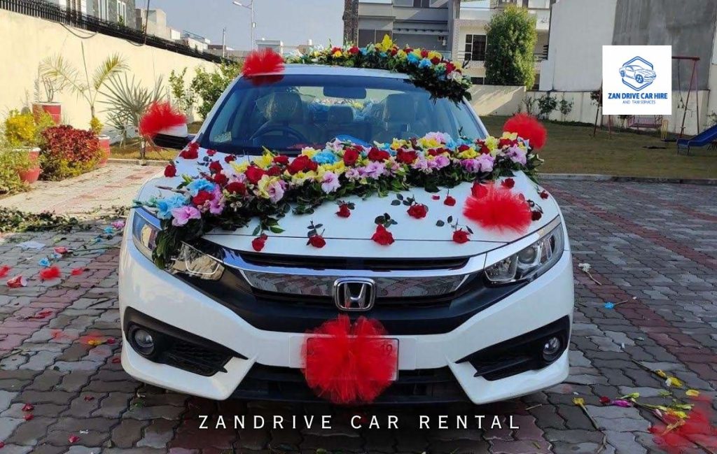 Zanzibar wedding car with floral ribbons for Zanzibar beach ceremony