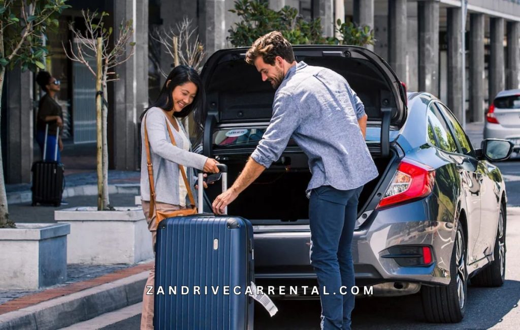 Solo female traveler picking up a rental car at Zanzibar Airport