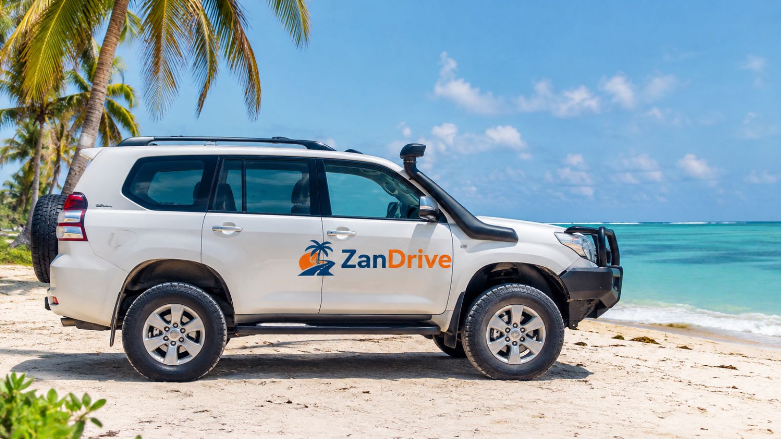 A 4x4 parked on a sandy palm-lined track, the kind of road common on the approach to Bwejuu's lodges