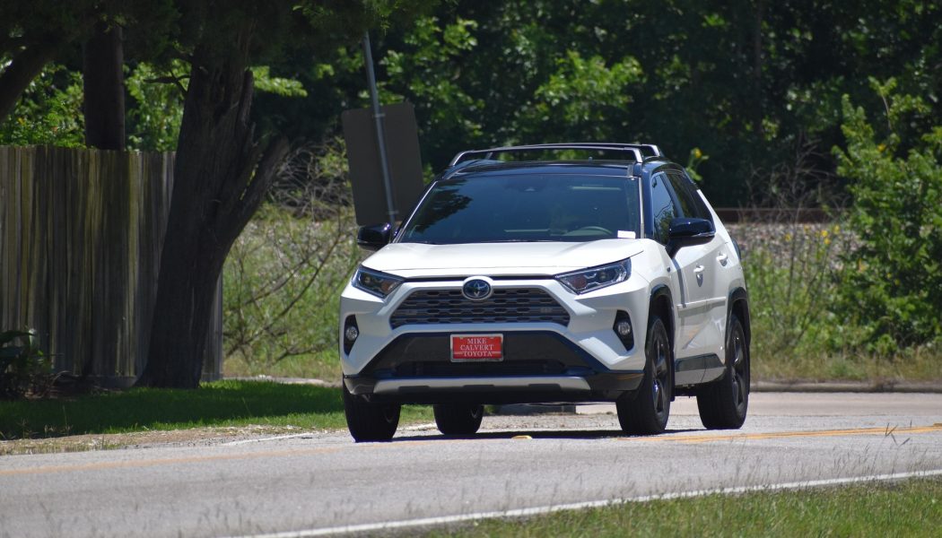 things to do in zanzibar tourist attractions Toyota RAV4 driving on Zanzibar coastal road for tourist self-drive