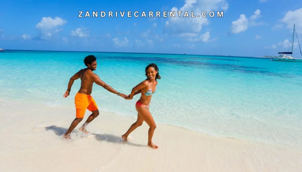couple walking on Nakupenda Beach Nature Reserve white sand at low tide Zanzibar honeymoon romantic Indian Ocean